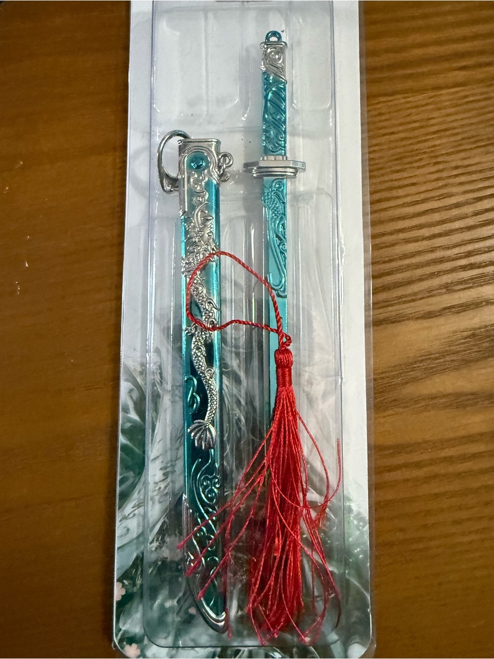 Teal Dragon Sword Pendant with Red Tassel - Women's Accessory